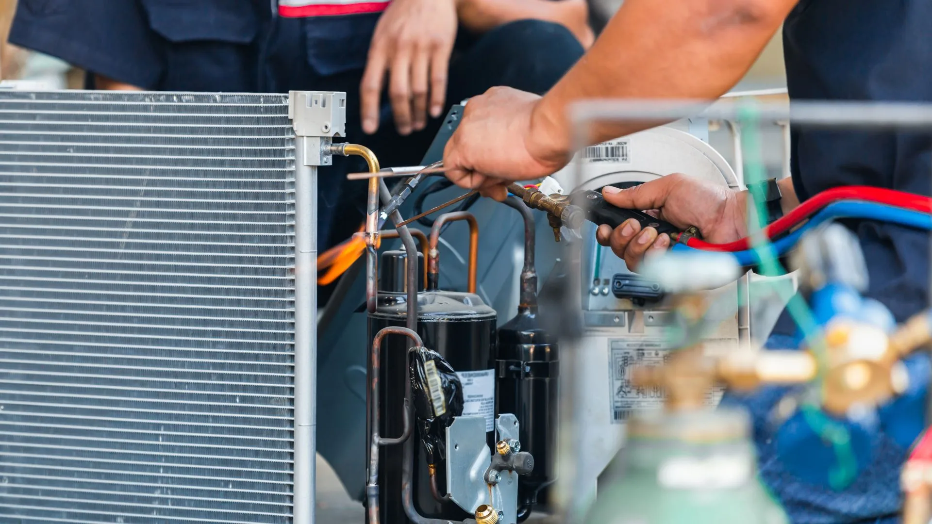 A repairman during furnace maintenance in Elk Grove.