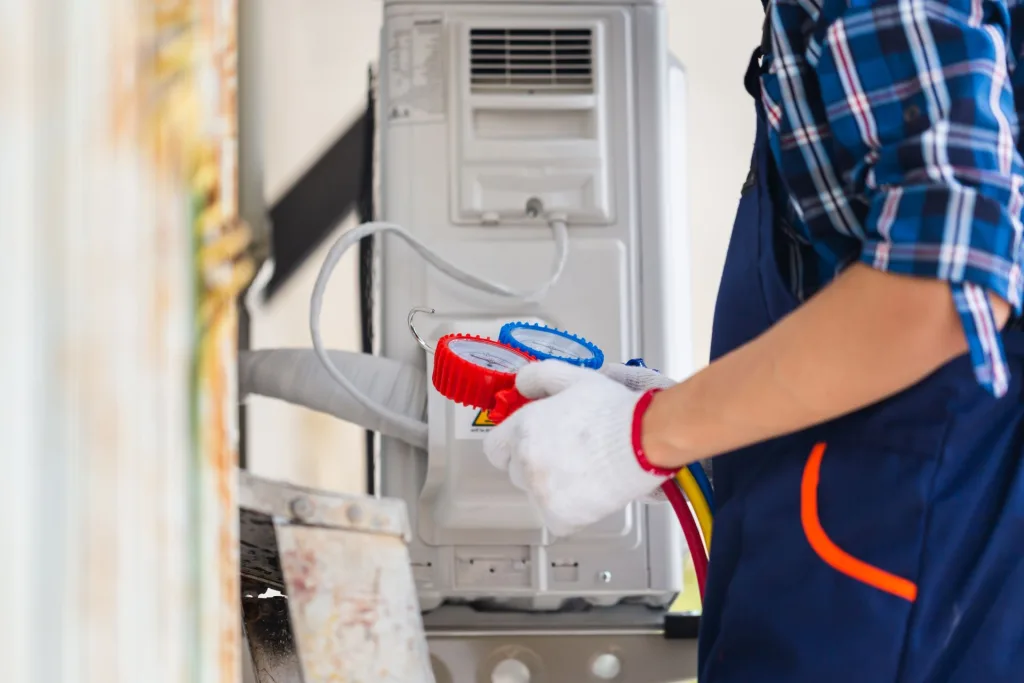 worker installing new furnace system