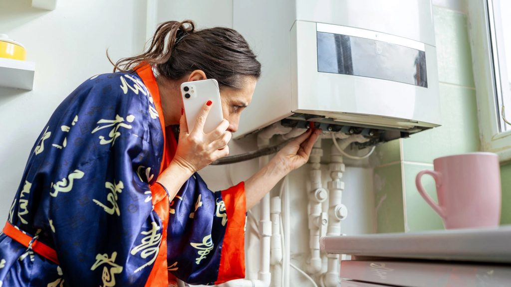 woman whose furnace broke down calls boiler service