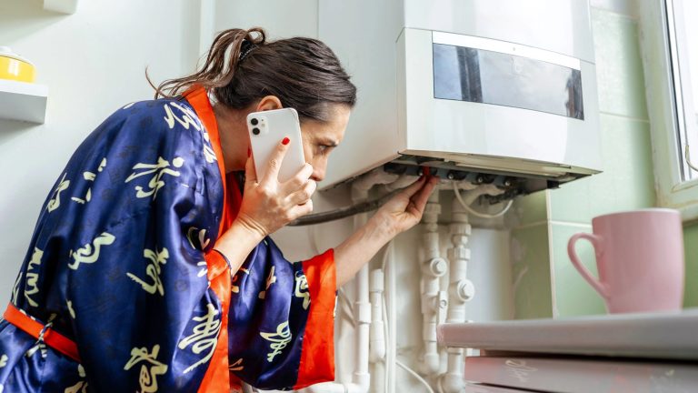 woman whose furnace broke down calls boiler service