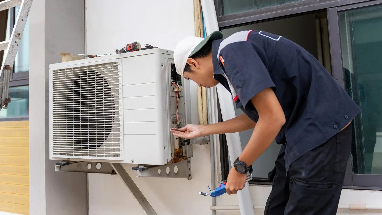 Air conditioner maintenance service in Elk Grove home with outdoor condenser inspection