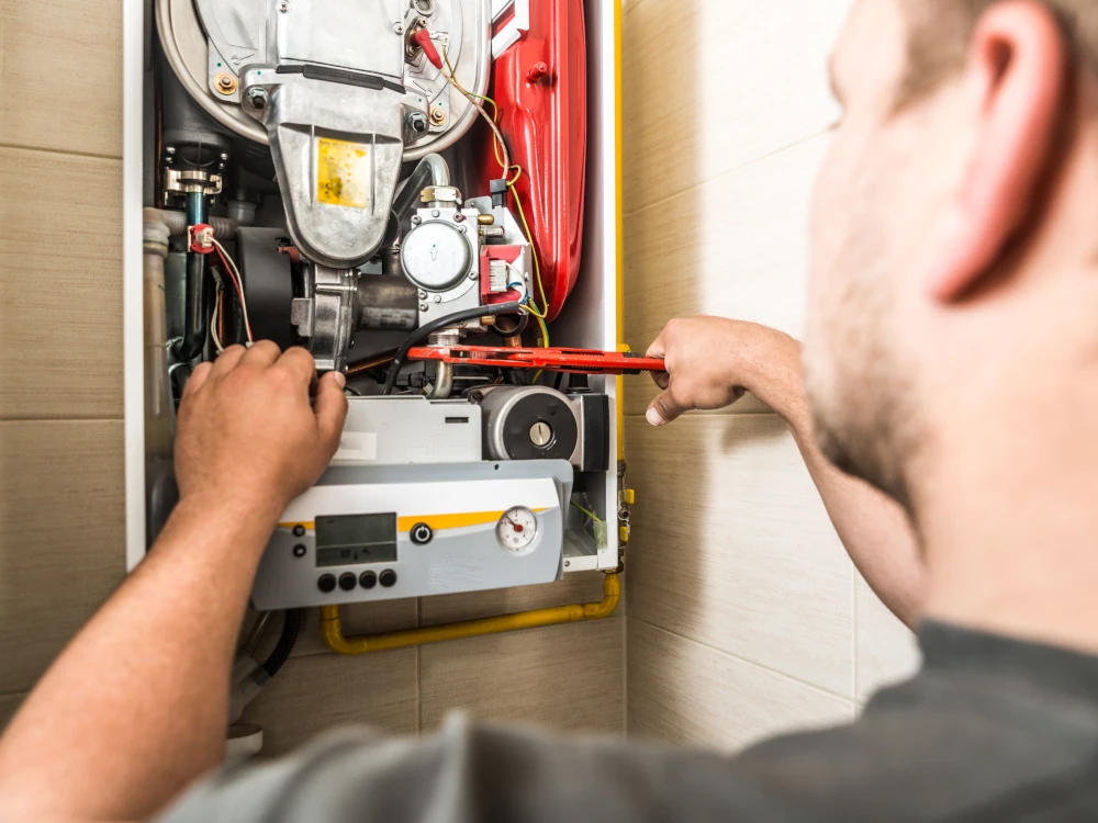 Professional HVAC technician performing a modern heating system setup and furnace installation elk grove ca.